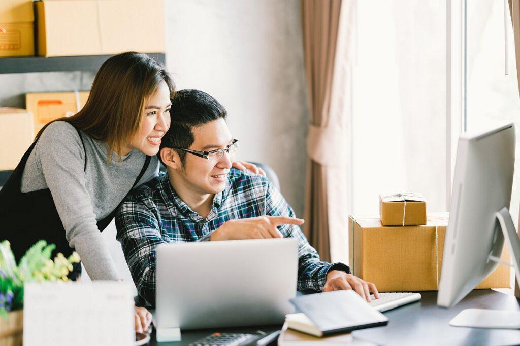 Young Asian couple startup family business
