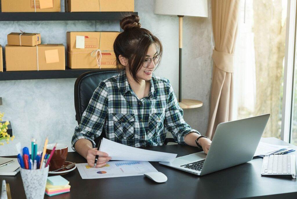 Happy young entrepreneur work at home